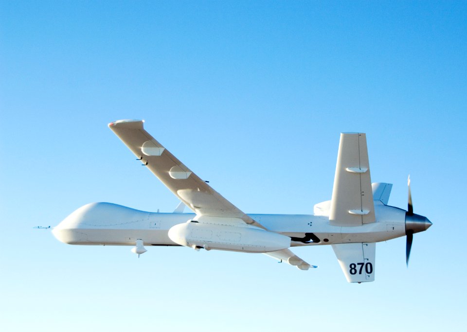 NASA's Ikhana unmanned aircraft cruises over California during the Western States Fire Mission with its thermal-infared sensor pod under its left wing.