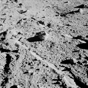 Two moon-exploring crew men of the Apollo 14 lunar landing mission, photographed and collected the large rock pictured just above the exact center of this picture.