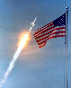 The American Flag heralds the flight of Apollo 11, man's first lunar landing mission. photo
