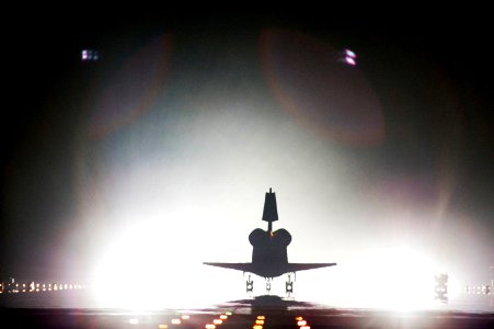 Xenon lights help lead space shuttle Endeavour home to NASA's Kennedy Space Center in Florida. Endeavour landed for the final time on the Shuttle Landing Facility's Runway 15, marking the 24th night landing of NASA's Space Shuttle Program. photo