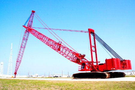 At NASA's Kennedy Space Center in Florida, a heavy-duty crane is slowly making its way to Launch Pad 39B. photo