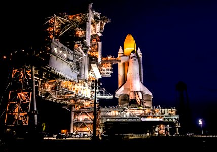 Space shuttle Atlantis, attached to its bright-orange external fuel tank and twin solid rocket boosters on Launch Pad 39A at NASA's Kennedy Space Center in Florida. photo