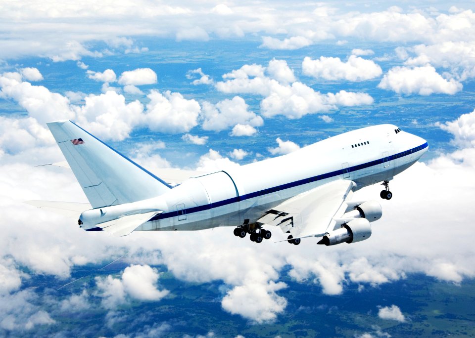 NASA's Boeing 747SP SOFIA airborne observatory soars over a bed of puffy clouds during its second checkout flight over the Texas countryside on May 10, 2007.