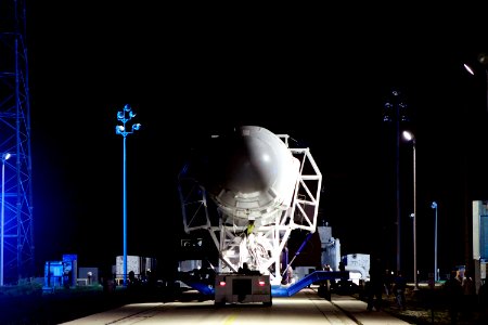 he SpaceX Falcon 9 rocket makes its way to the pad at Space Launch Complex-40 on Cape Canaveral Air Force Station in Florida. photo