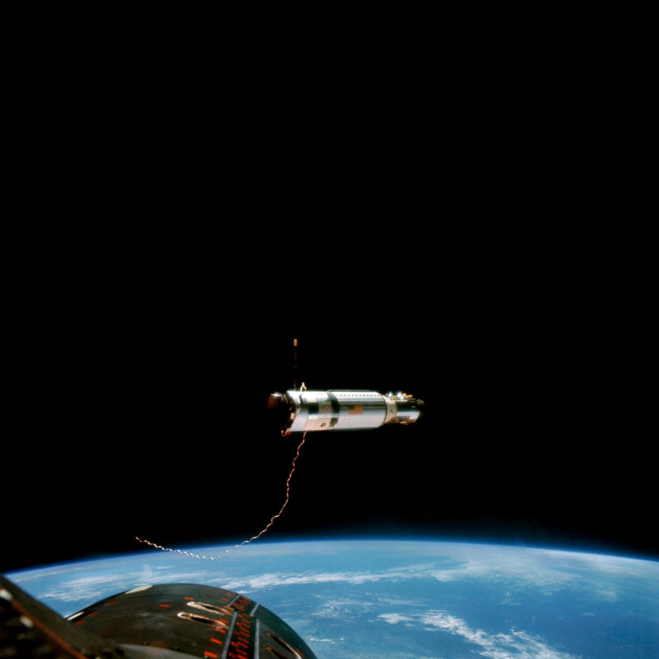 The Agena Target Docking Vehicle at a distance of approximately 80 feet from the Gemini-11 spacecraft.