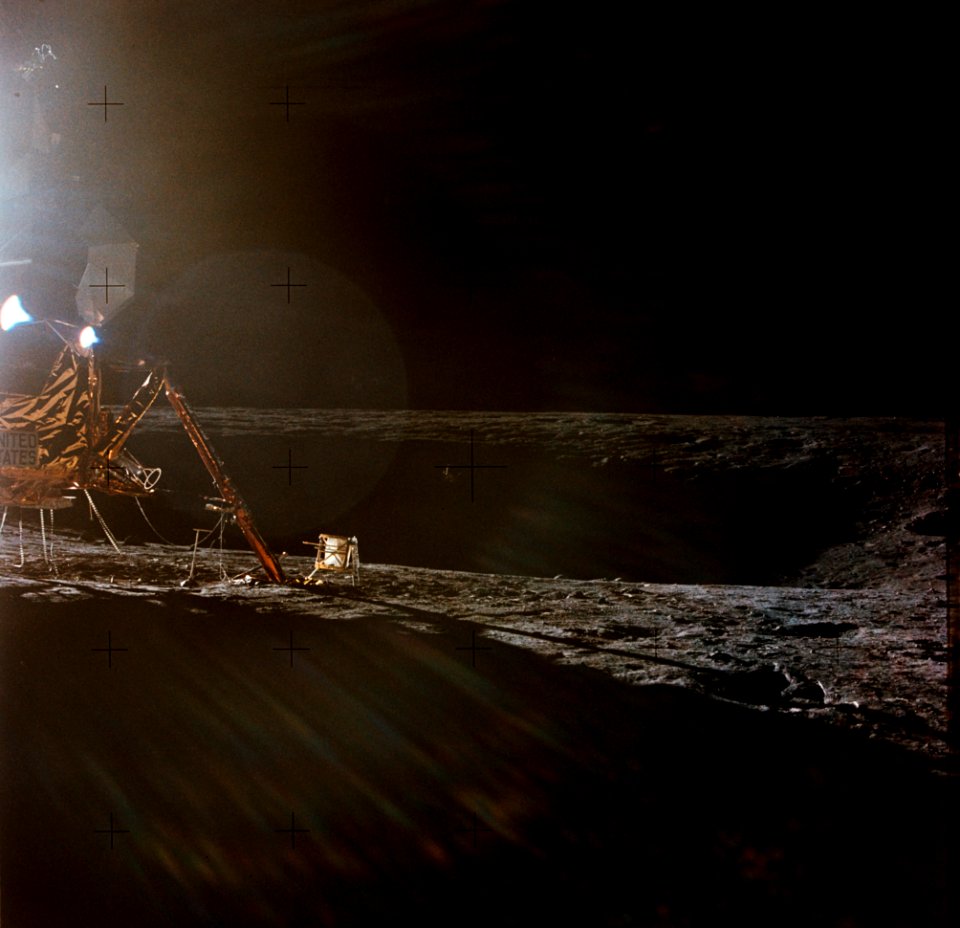 A photograph of the Apollo 12 lunar landing site taken during the extravehicular activity (EVA) of astronauts Charles Conrad Jr., commander; and Alan L. Bean, lunar module pilot.