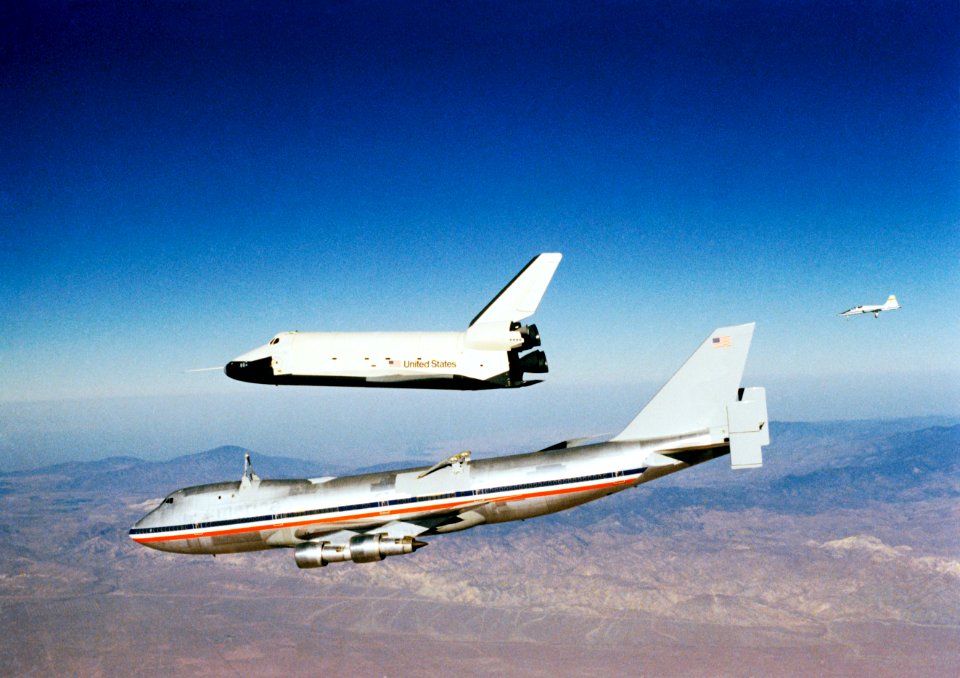 The Orbiter 101 "Enterprise" separates from the NASA 747 carrier aircraft S77-28931 to begin its first "tailcone-off" unpowered flight over desert and mountains of Southern California. Oct 12th 1977.