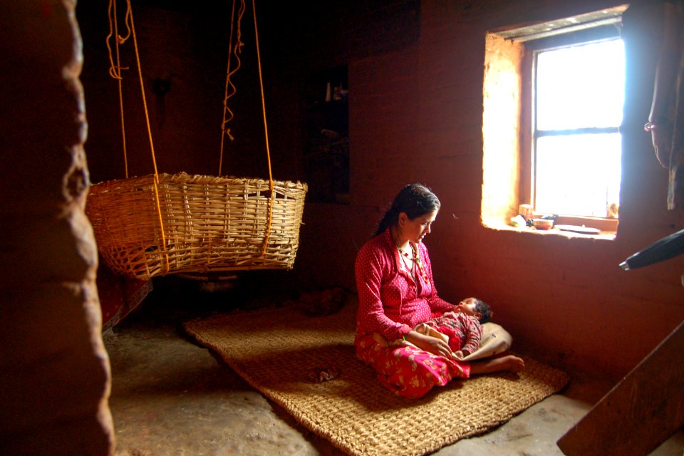 A Nepalese Mother and Her Infant. Original image sourced from US Government department: Public Health Image Library, Centers for Disease Control and Prevention. Under US law this image is copyright free, please credit the government department whenever you can”.