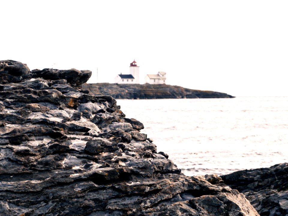 Gray Rock And House Near The Sea