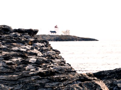 Gray Rock And House Near The Sea