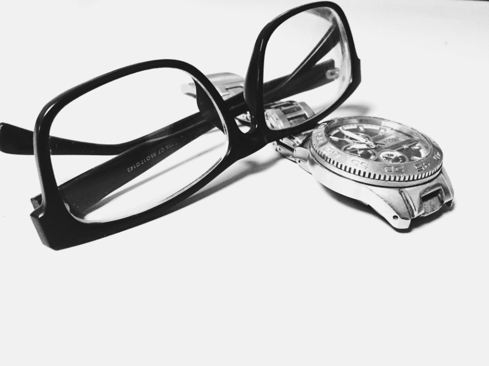 Eyeglasses And Watch