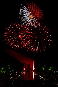 Red And White Fireworks Scattered During Nighttime