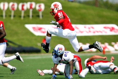 Football Player Pass By Over Reaching The Goal