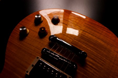 Product Photography Of Brown Electric Guitar photo