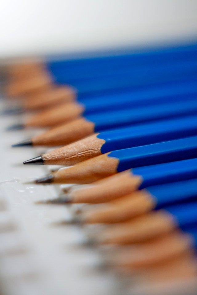 Tilt Shift Lens Photography Of Blue Pencils