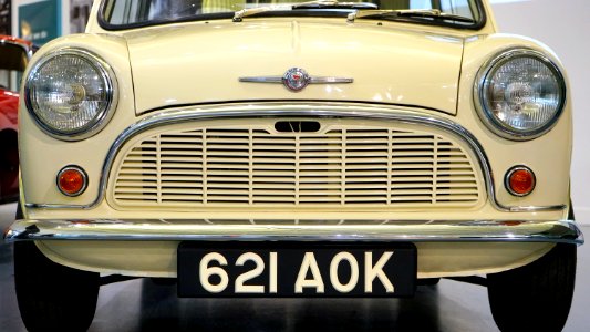 Yellow Classic Car With 621 Aok Licensed Plate photo