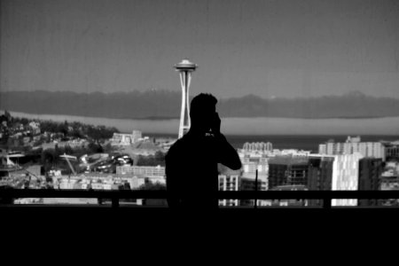 Silhouette Of Man Near Handrails