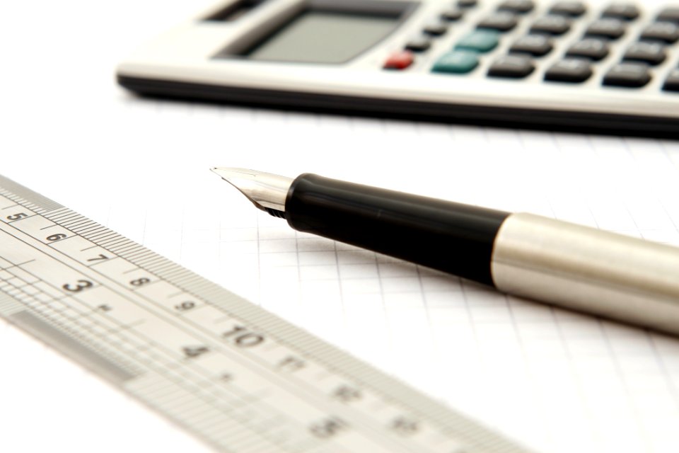 Shallow Focus Of Silver And Black Fountain Pen Beside Ruler And Scientific Calculator