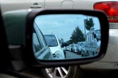 Car Side Mirror Showing Heavy Traffic photo