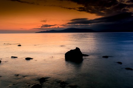 Rocks On Coastline At Sunset photo