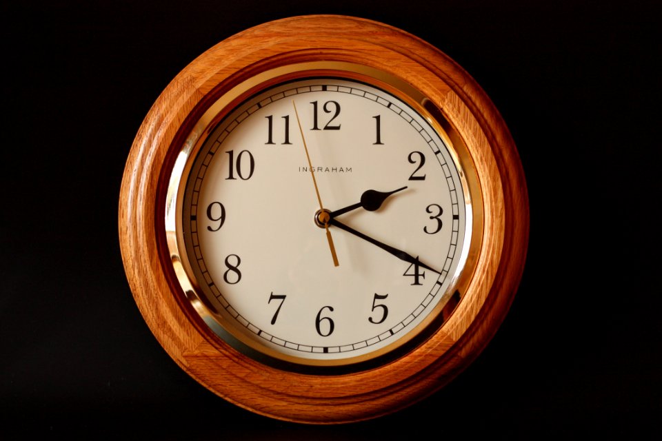 Brown Wooden Framed Clock Showing 219
