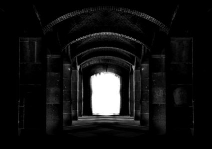 Black And White Photo Of A Tunnel photo