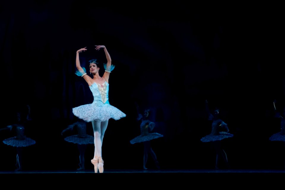 Woman In Blue Ballerina Dress Performing Dance