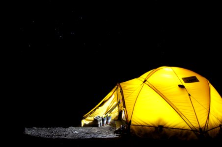 Yellow Tent Under Starry Night photo