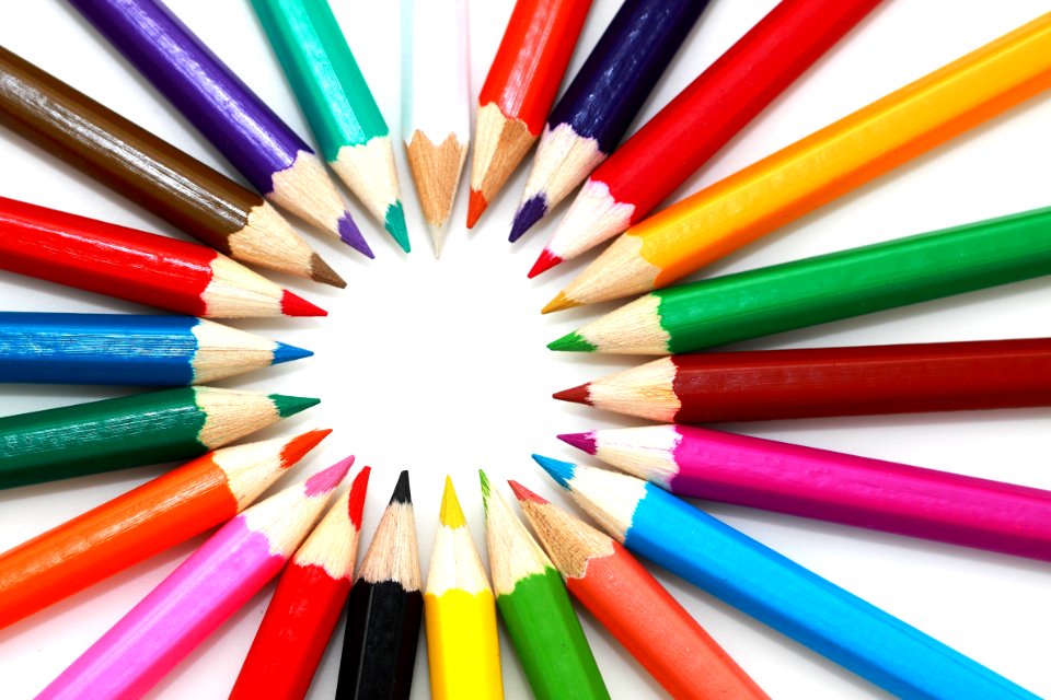 Colored Pencil On Top Of White Surface