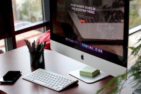 Apple Computer On Office Desk photo