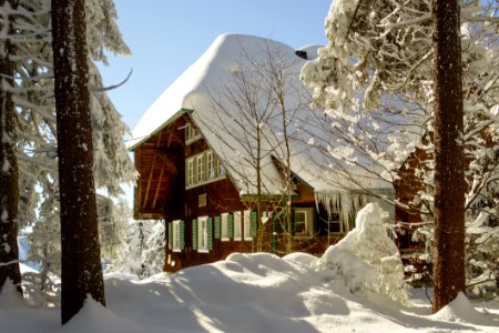 Snow Covered Chalet Lodge In Winter
