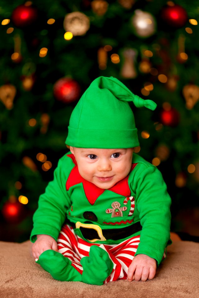 Boy In Santas Elf Costume