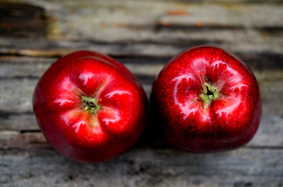 Two Red Ripe Apple On Gray Table