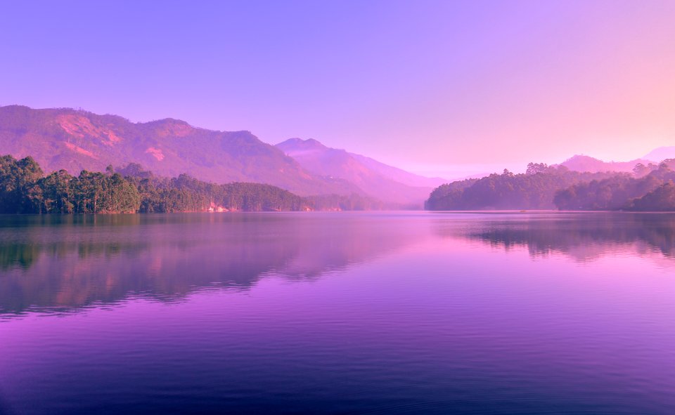 Sunset Reflecting In Mountain Lake photo