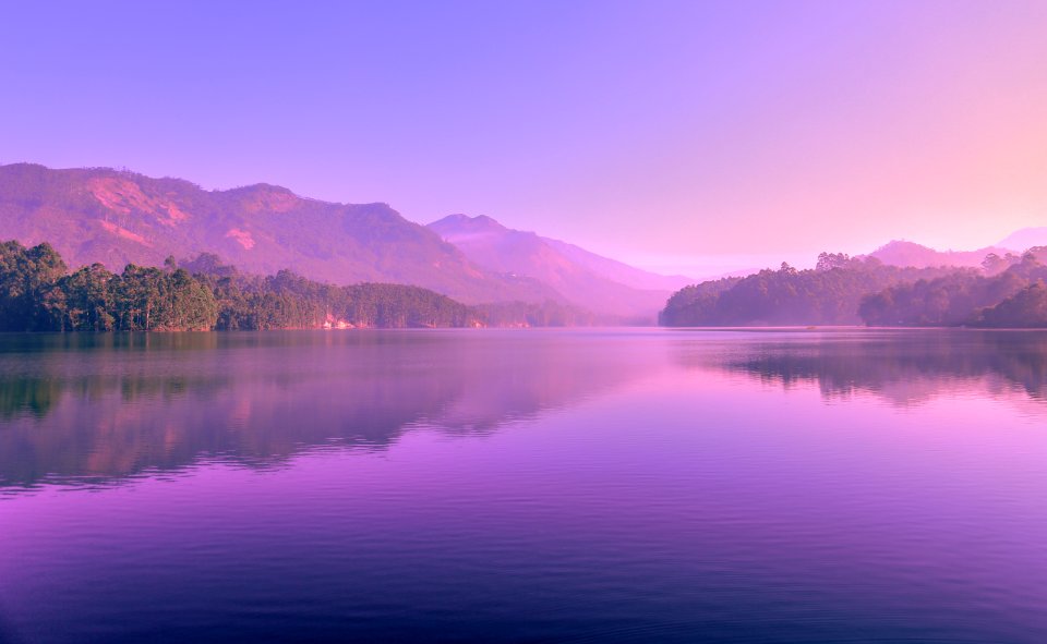 Sunset Reflecting In Mountain Lake