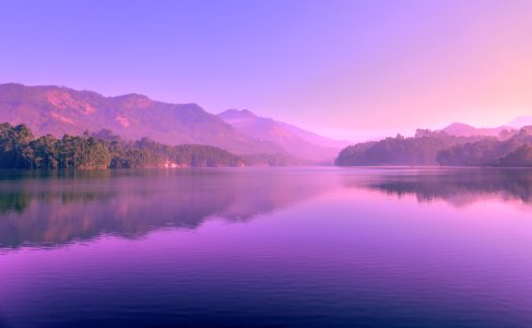 Sunset Reflecting In Mountain Lake