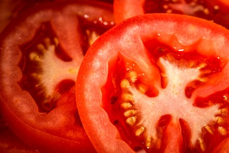 Slices Of Fresh Red Tomatoes photo