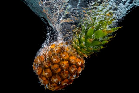 Pineapple Splashing In Water