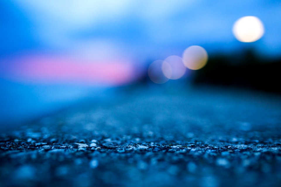 Shallow Focus Photography Of Gray Asphalt Floor
