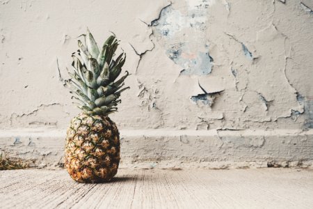Pineapple Beside Concrete Wall photo