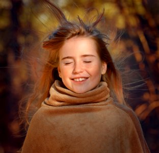 Smiling Girl In Outdoor Portrait