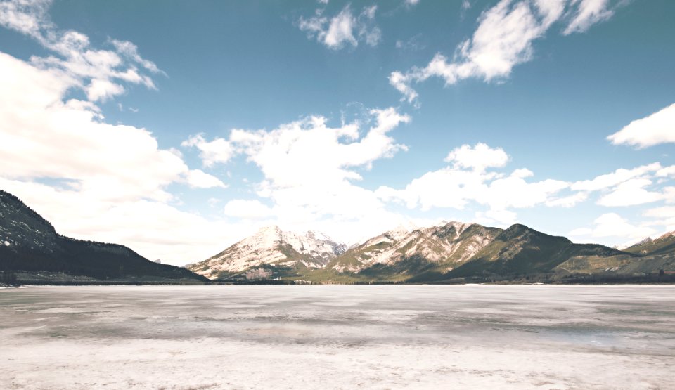 White Brown Mountain Under White Cloud And Blue Sky During Daytime photo