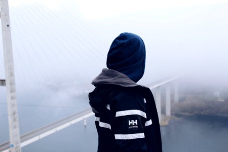 Man Standing Looking Down