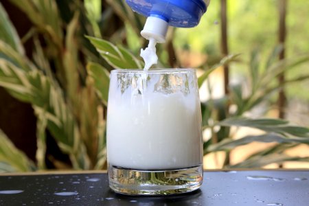 Glass Of Milk On Table photo