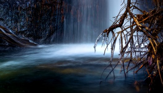 Scenic View Of Waterfall During Winter