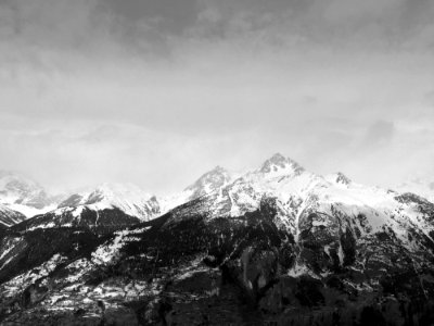 Scenic View Of Snowcapped Mountains Against Sky photo