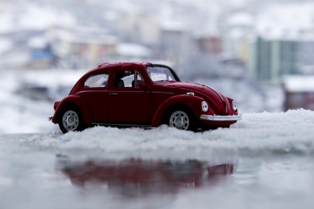 Red Toy Car In Snow photo