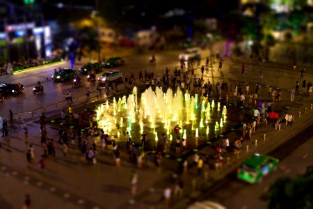 Fountain Surrounded By People During Nighttime photo