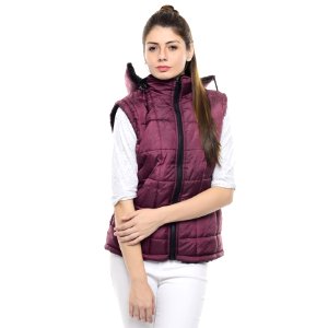 Woman In Pink Zippered Bubble Vest And White Jeans