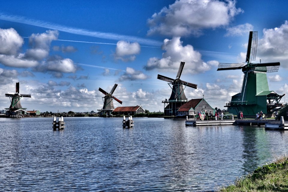 Wooden Windmills Near Lake